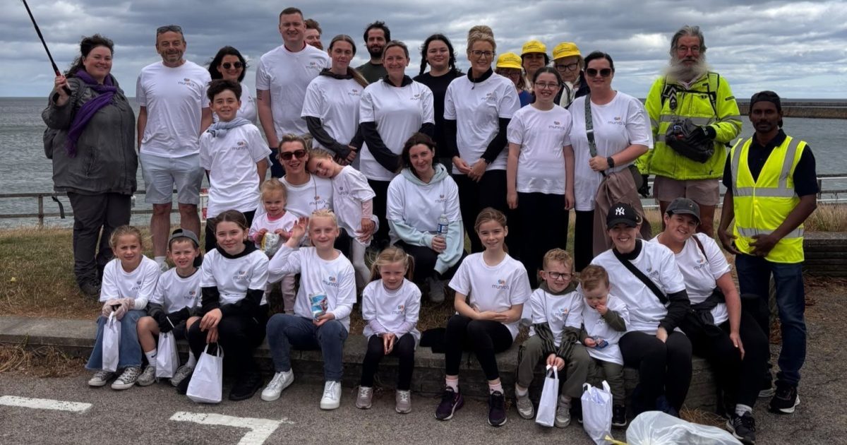 OpenGraph Image for Munro's Travel staff and families join Aberdeen community beach clean
