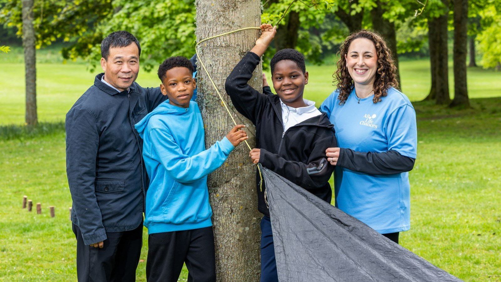 All Life Chances & Fireflies – Den building, Mr Baoshan Lu, CNOOC International and young people benefiting from the project and Lara Munro, All Life Chances