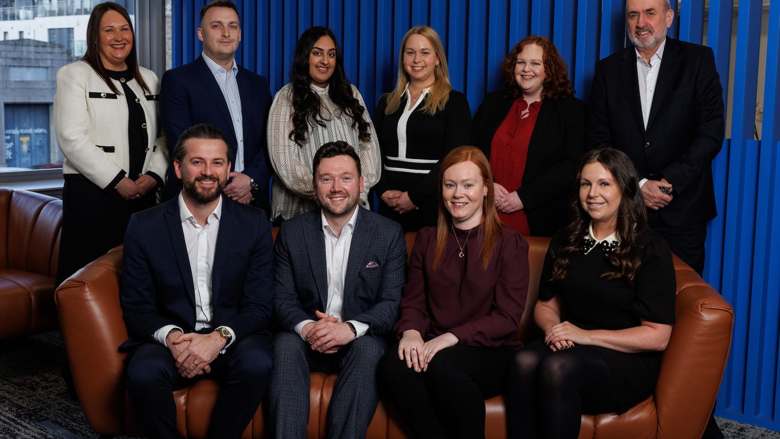 back row l-r Leanne Warrender (existing property Partner), Jordan Watt, Attika Ahmad, Claire Munro, Alannah Russell, Michael Sinclair (Senior Partner); front row l-r Michael Madden, Michael Leith, Katie Hutchinson and Stevie Kelman