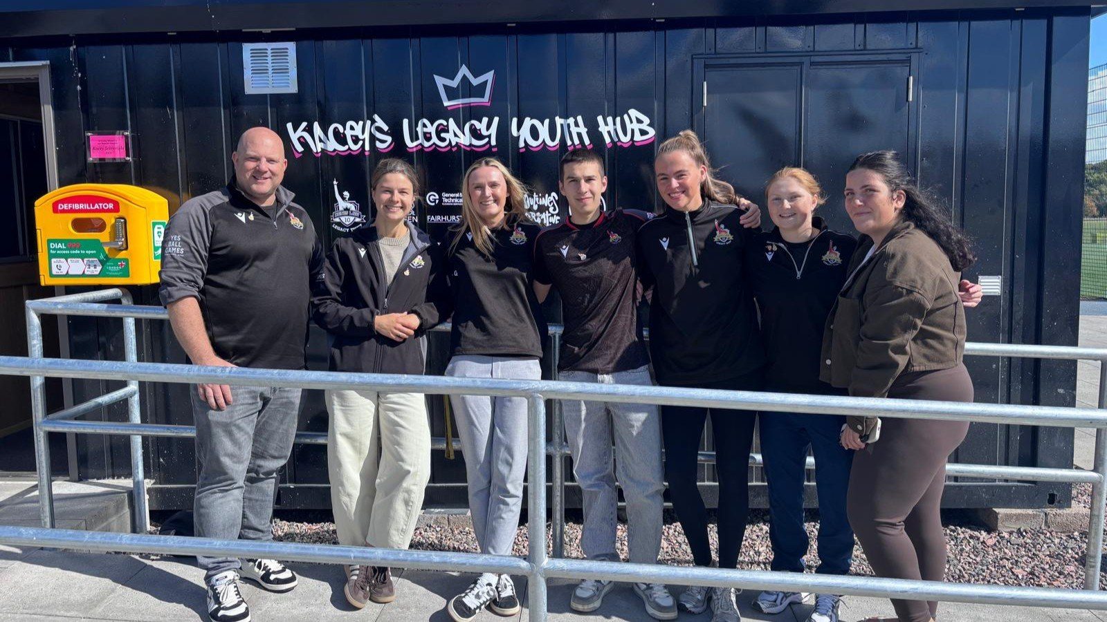 Mark Williams with Kelsey and some of the DLLT Team