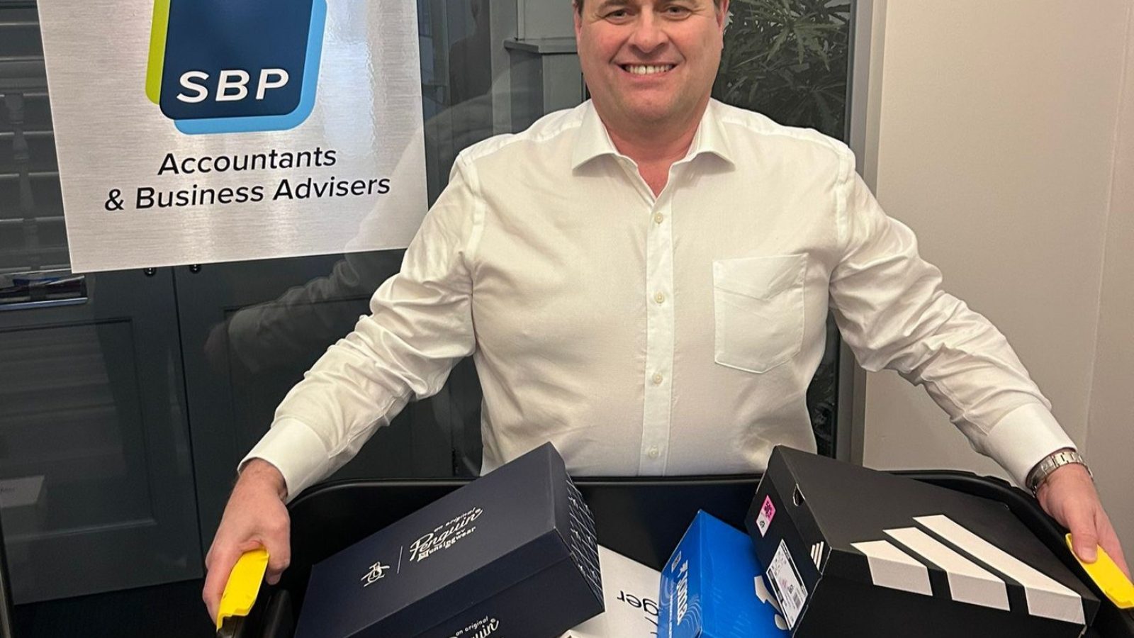 CEO John Hannah with the donation.