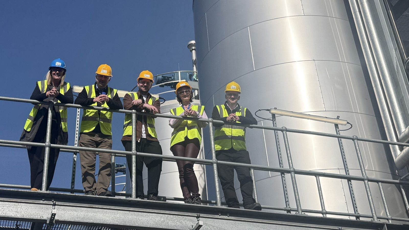 Left to Right: Lorna Woodcock, Head of Technical, Research & Innovation, Celtic Renewables; Ian Sanders, Chief Commercial Officer, NCIMB; Dr Darren Scobie, Applied Research Lead, Celtic Renewables;  Bettina Brierley, Chief Commercial Officer, Celtic Renewables and Dr Reuben Carr, Technology Commercialisation Manager, NCIMB, at the Celtic Renewables plant in Grangemouth.
