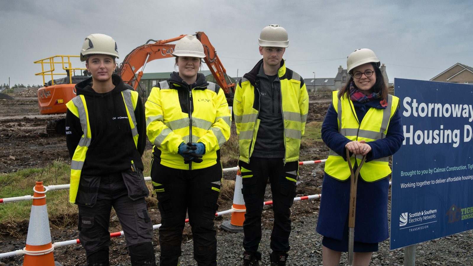 DFM with local apprentices working at Stornoway Airport Housing Development site
