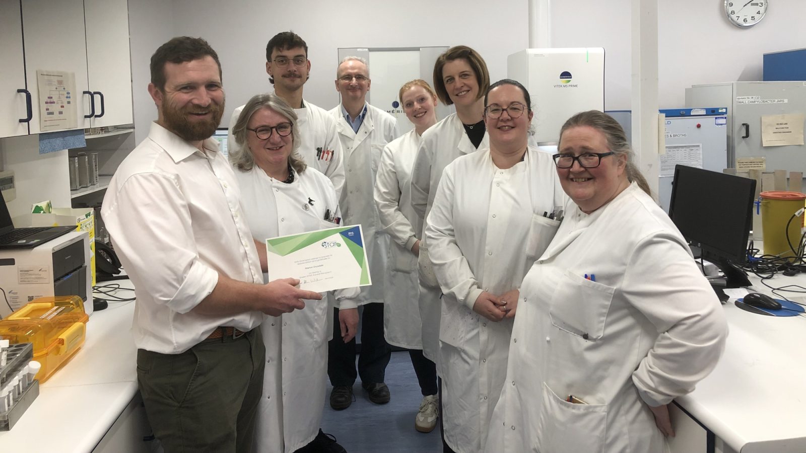 Michael (far left) and Marion (far right) with members of the labs team at Aberdeen Royal Infirmary.