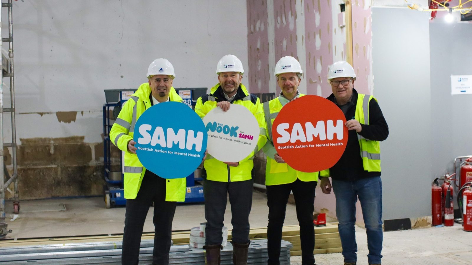 Image shows (from left) Douglas Smith (Hardies Chartered Surveyors); Keith McPhee (Burns Construction (Aberdeen) Ltd); Jason Bryce (SAMH); and J