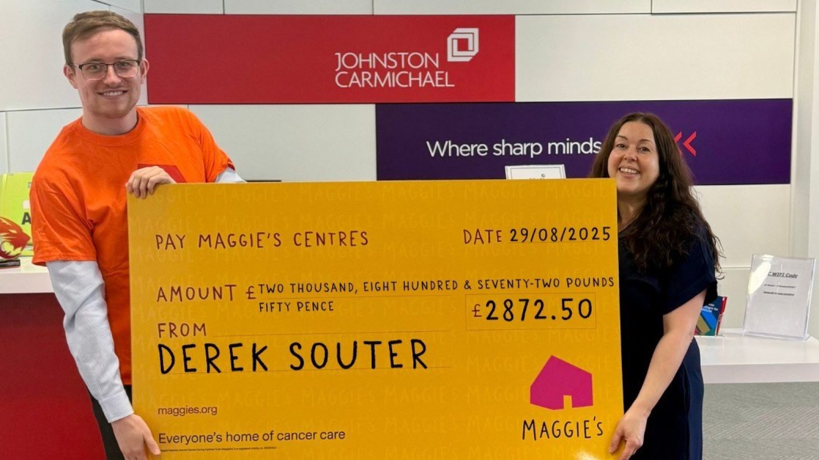 Johnston Carmichael Business Advisory Senior Manager Derek Souter pictured handing over a cheque to staff at cancer charity Maggie’s Dundee after his charity skydive  Issued on behalf of Johnston Carmichael by BIG Partnership.