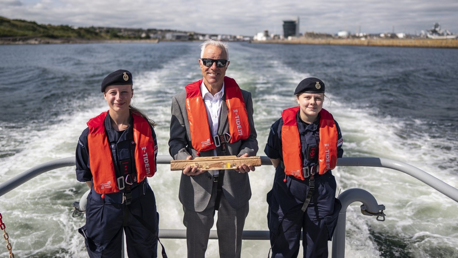 Port of Aberdeen CEO Bob Sanguinetti DL with Aberdeen Sea Cadets Rebecca Milne and Erin Wilkinson