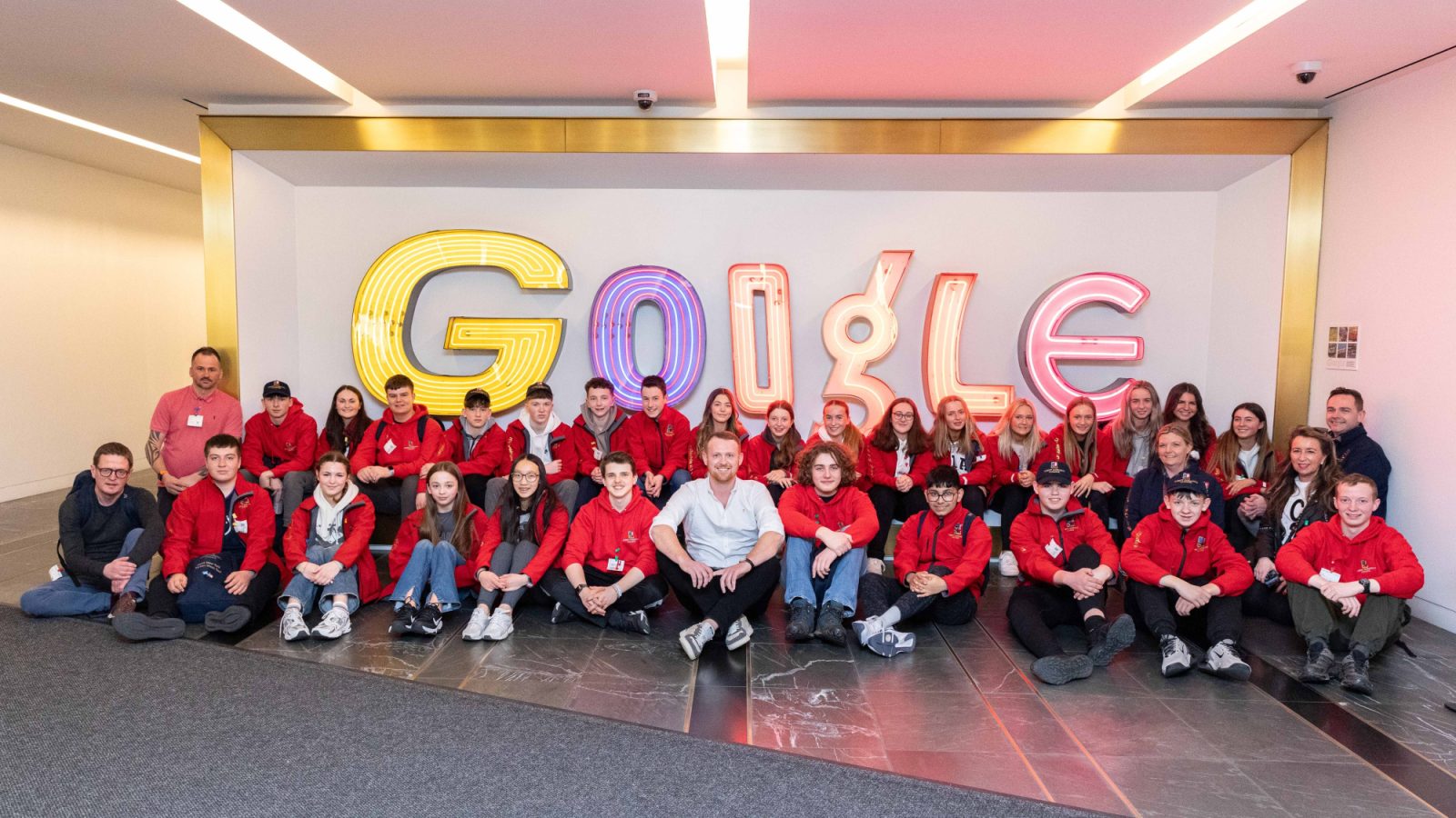 Former pupil Niall Mackenzie with current Robert Gordon's College pupils