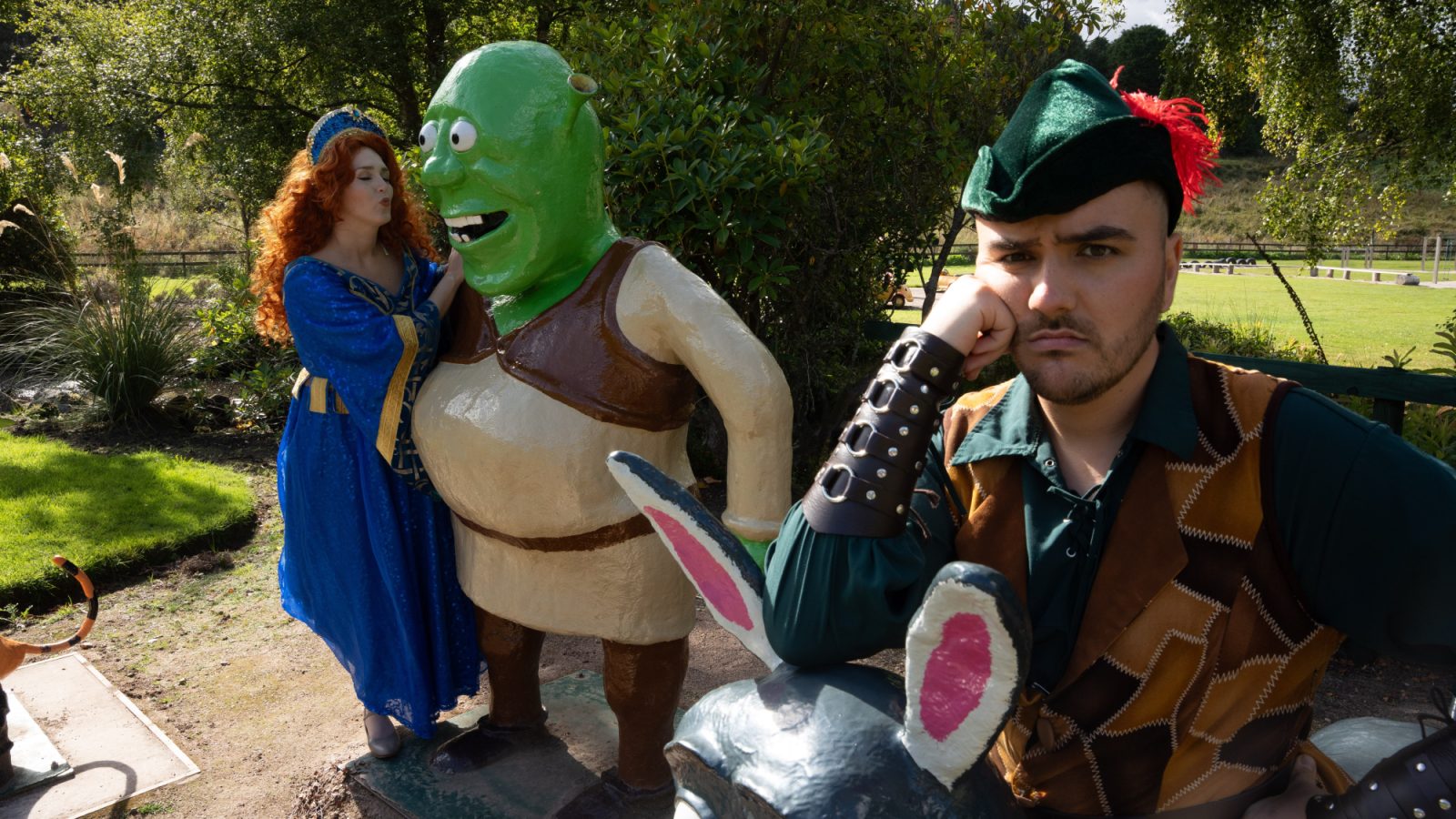 Robin Hood (Xander Gordon) is jealous of the attention Maid Marrian (Megan Wright) is paying Shrek