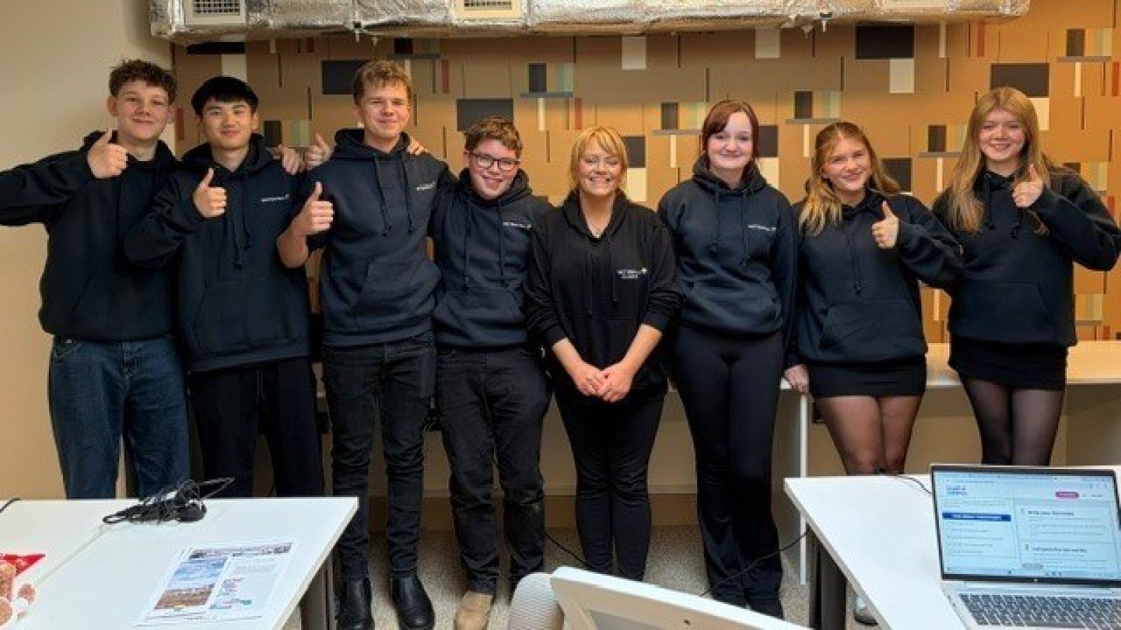 The Gordon Schools inaugural cohort, SCQF Level 6 Foundation Apprenticeship in Business Skills participating pupils, in their co-working space at No. 30 in Huntly with Kerry Birse (centre), Local Liaison Officer for Clashindarroch II at Vattenfall.
