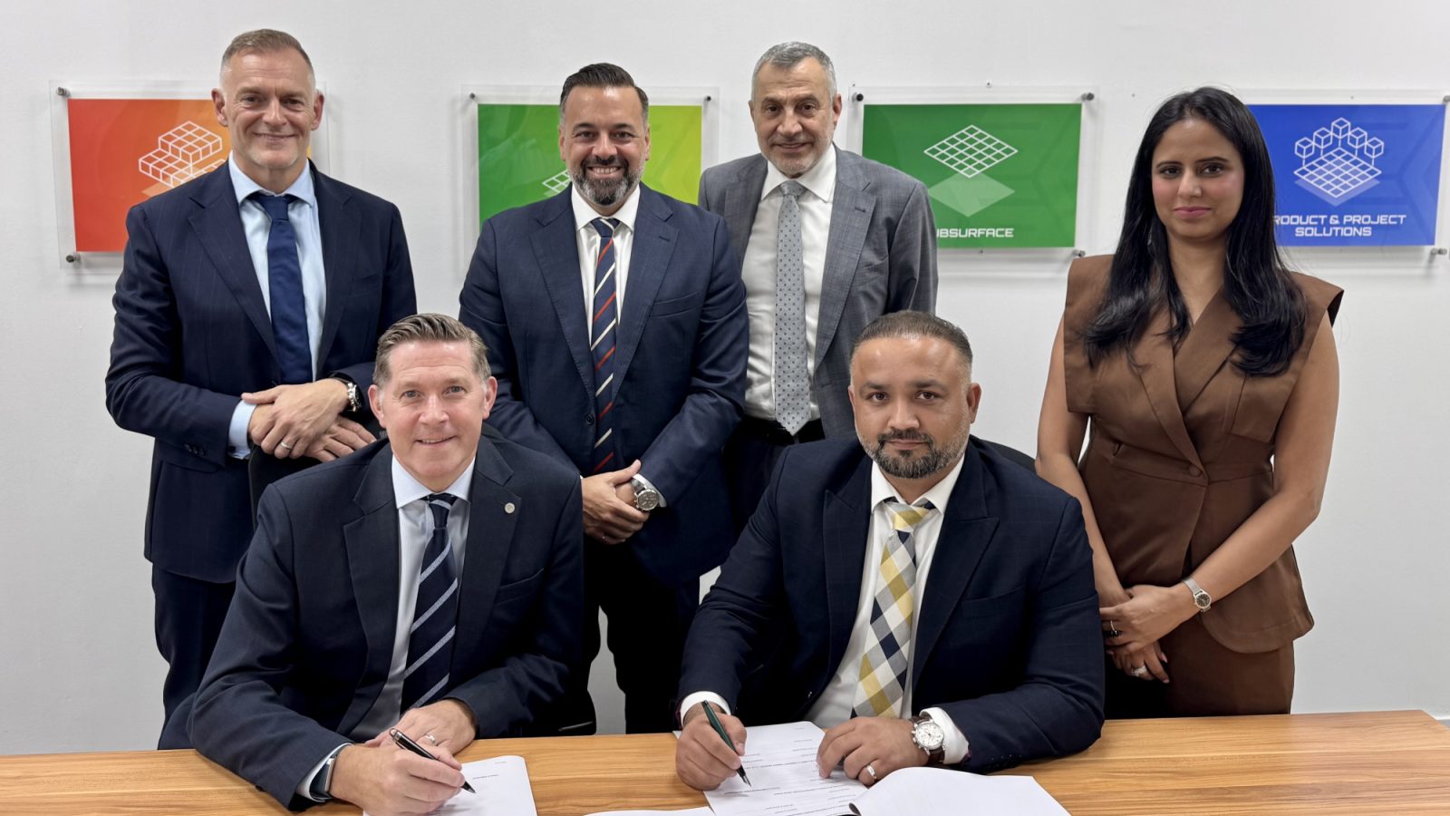 Contract signing between Walter Thain, CEO of THREE60 Energy, and Chetan Pathania, Managing Director of Total Vision.