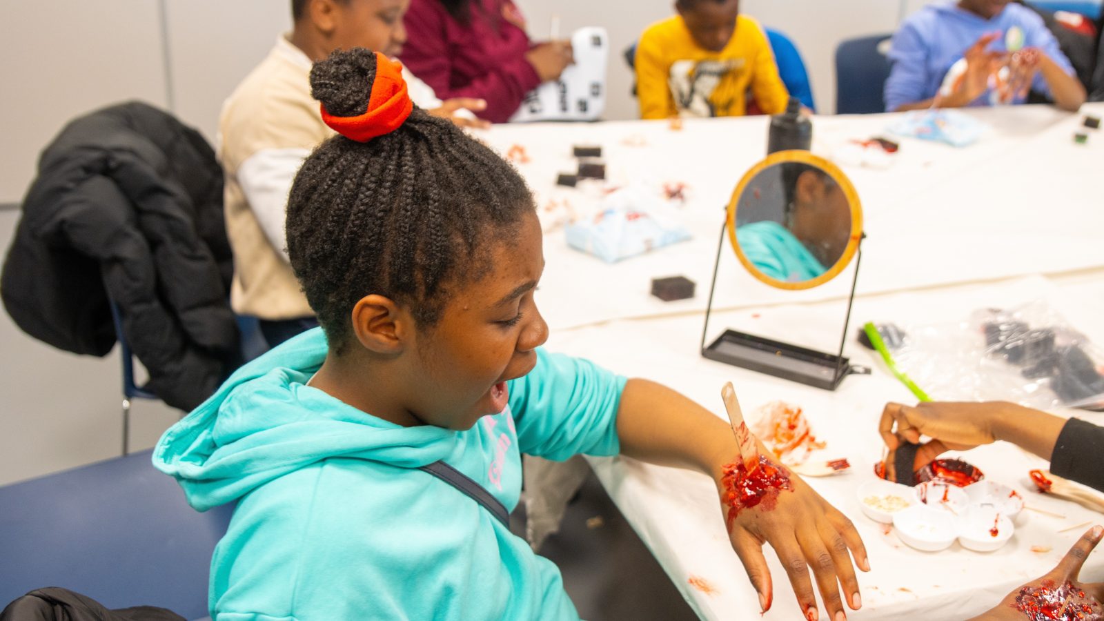Young people engage in group activities during Touch of Love Outreach’s three day Holiday Club.