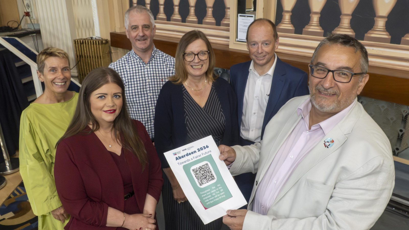 Aberdeen City Council Co-Leader Councillor Allard (foreground) with representatives of Community Planning Aberdeen (back, left to right: Jillian Evans, Head of Health Intelligence and Divisional General Manger, Public Health, NHS Grampian; Graeme Simpson, Chief Officer, Children’s Social Work and Family Support at Aberdeen City Council; front, left to right: Michelle Crombie, Strategic Lead, Prevention and Community Empowerment at Aberdeen City Council; Alison Macleod, Strategy and Transformation Lead, Aberdeen City Health and Social Care Partnership; Duncan Abernethy, Director of Business Development at North East Scotland College.