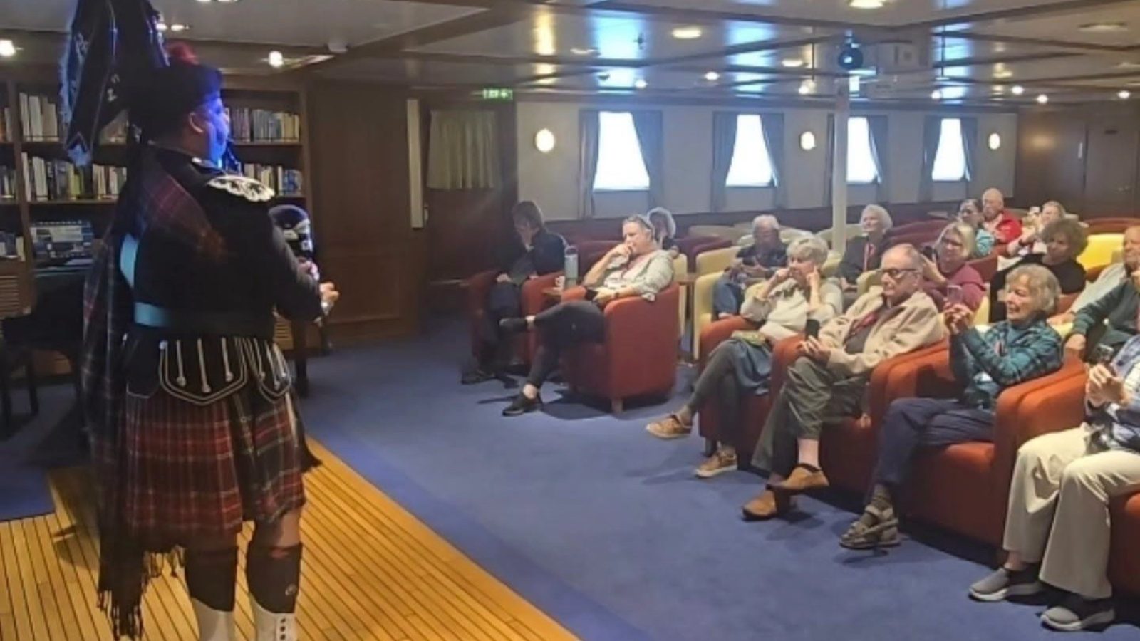 Luxury cruise guests enjoy interactive bagpipe experience in Aberdeen