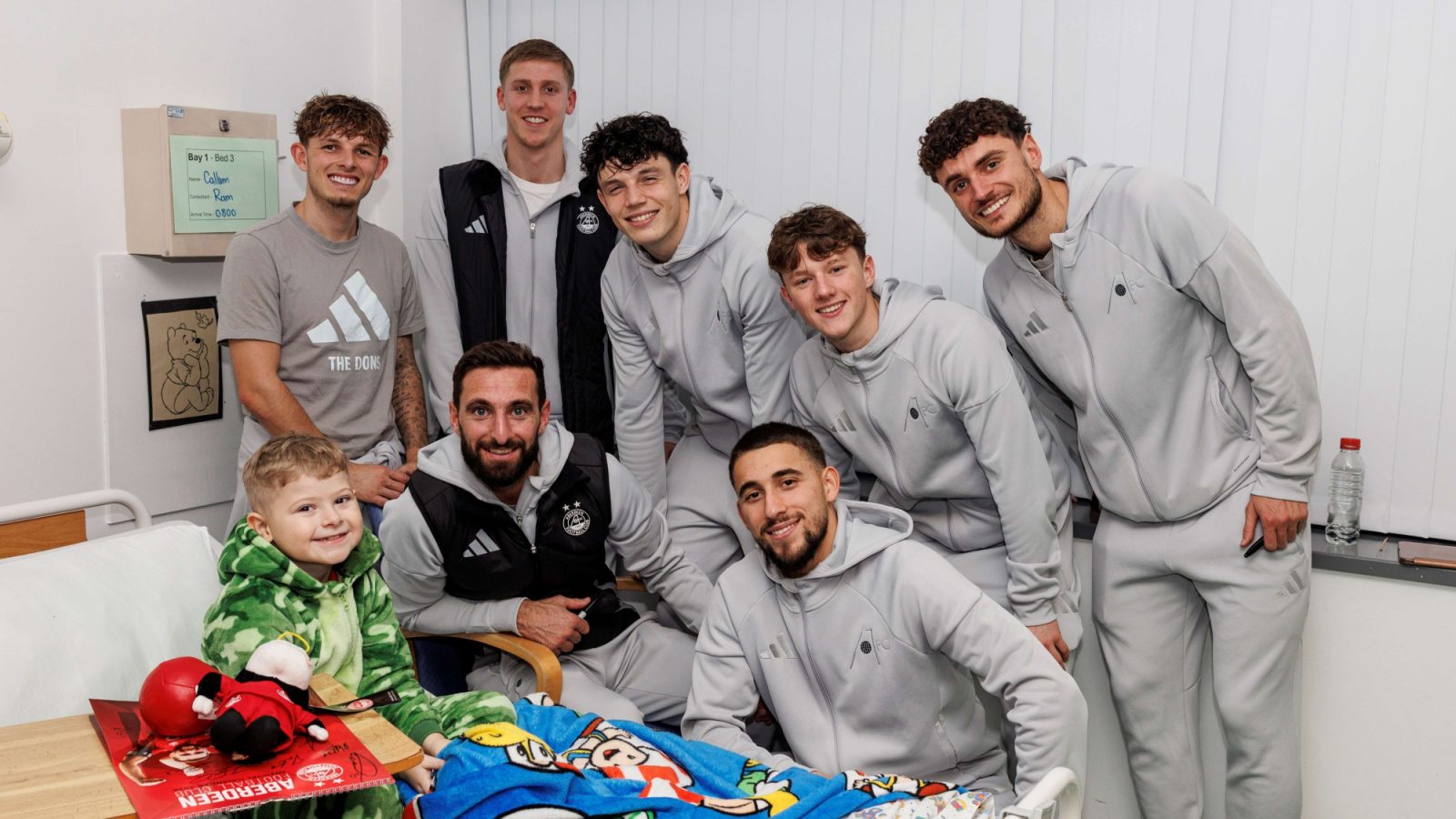 Dons stars bring festive cheer to young patients at children's hospital