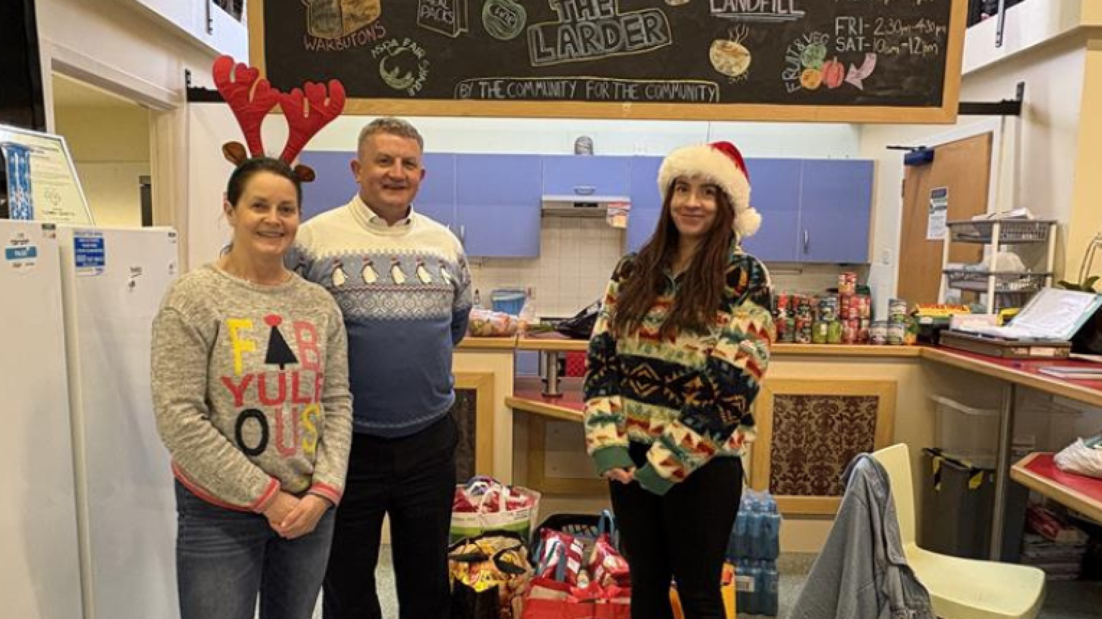 Create “elves” deliver festive food donation for local charity