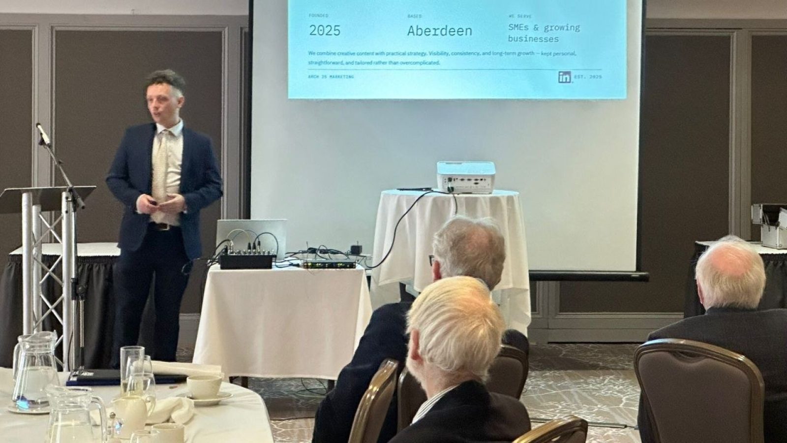 Arch 35 speaks at business club